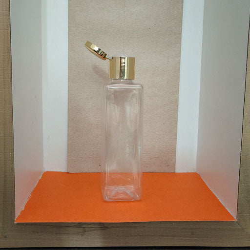 100 ml  Square Transparent Gold Flip Top Cap